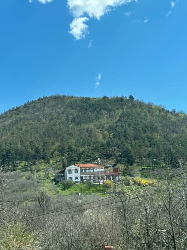 Morning traffic on mountain road in rural Bulgaria