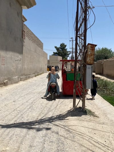 Daily Life Moments Captured Around Kandahar Waterways and Streets