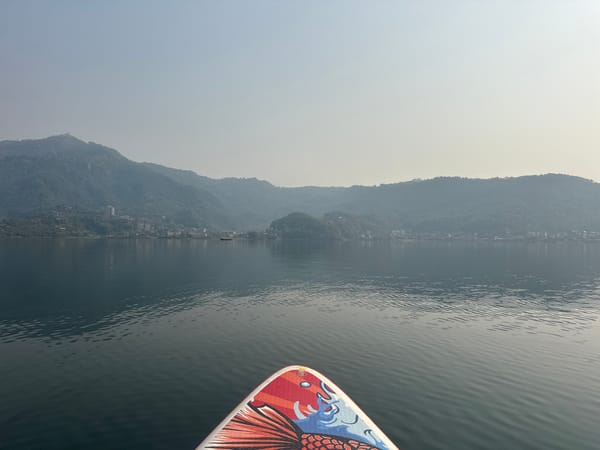 Early morning paddleboarding captured on Nepal's Phewa Lake