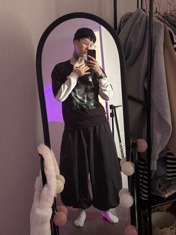 Person takes mirror selfies in Saratov clothing store