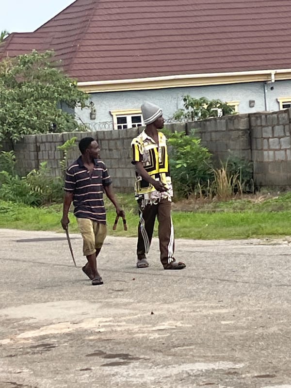 Morning street life on a residential road in Abuja