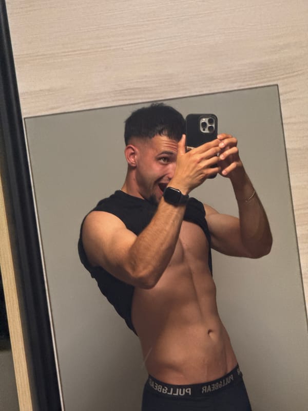 Young man takes multiple mirror selfies in Shumen bedroom
