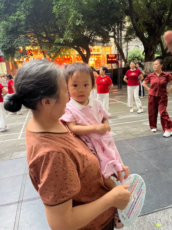 Everyday life in a Chongqing plaza, from dancers to delivery riders