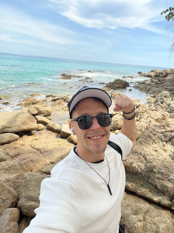 Rocky beach morning in Choeng Thale draws fishing, relaxing, and exploring