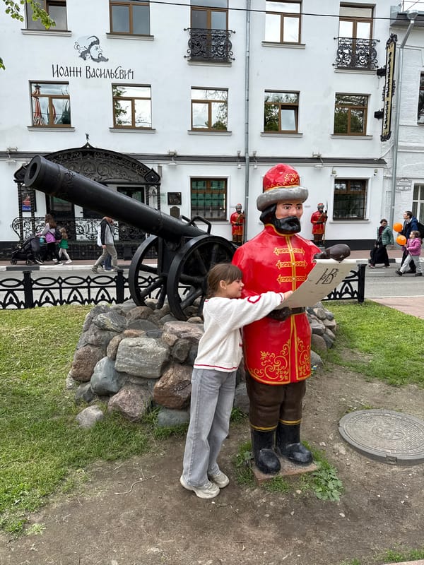Community gatherings documented across Russian towns near statues, waterfront