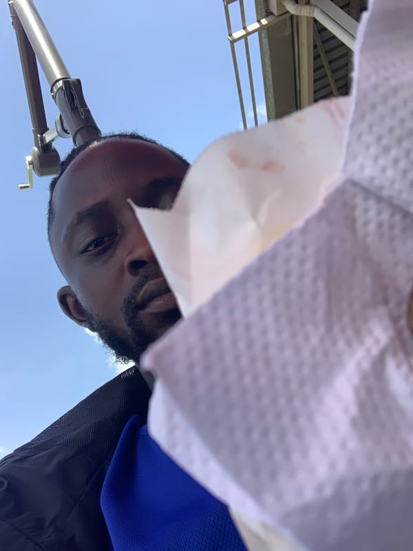 Man enjoys outdoor fast-food meal in Lekki, Nigeria
