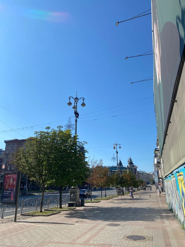 City streets, a golden-domed church, and transit snapshots
