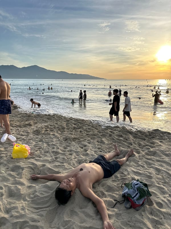 Sunset beach scene at My Khe Beach in Đà Nẵng