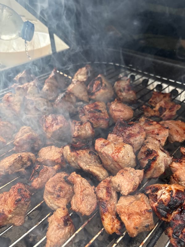 Morning backyard barbecue and garden time in Chalong, Thailand