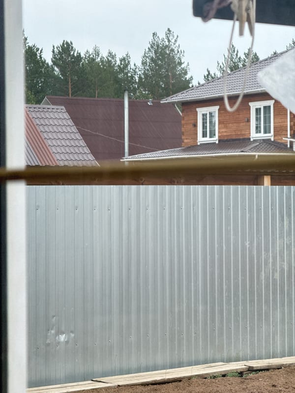 Morning observations: windows, lace curtains, and Toyota emblem documented