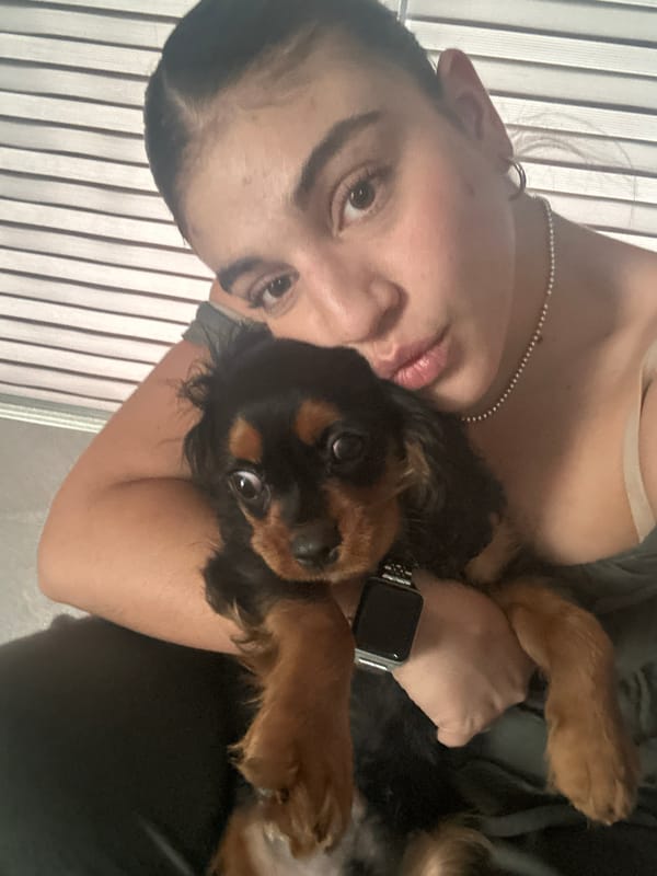 Woman takes selfie videos with puppy in Puebla