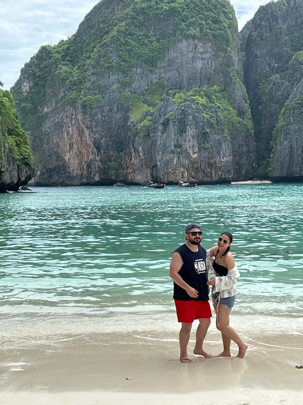 Tourists gather at Maya Bay beach during early morning hours