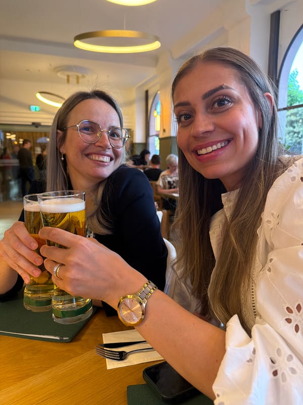 Friends celebrate with cocktails at Luxembourg restaurant May evening