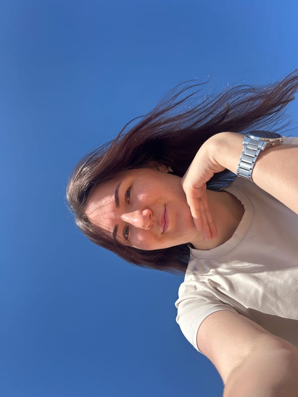Woman enjoys morning beach time in Noviy, Russia