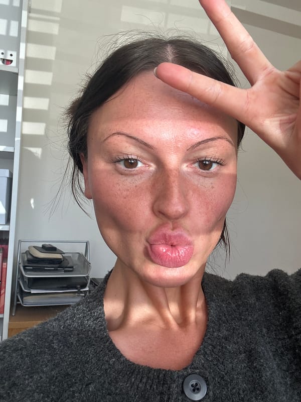 Woman takes peace sign selfie in Tunbridge Wells