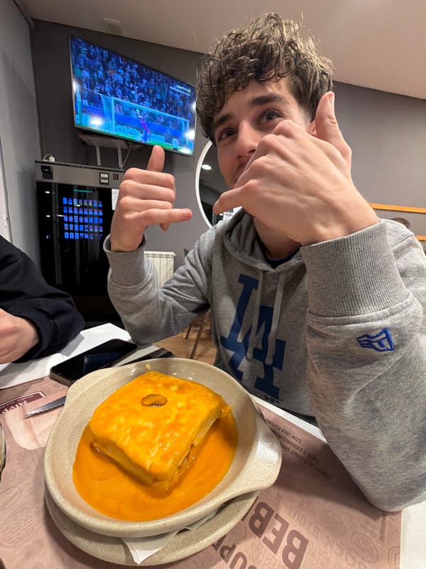 Diners review menus at Bragança restaurant