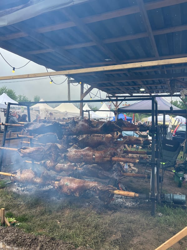 Traditional spit-roasting observed at outdoor gathering in Lyaskovets