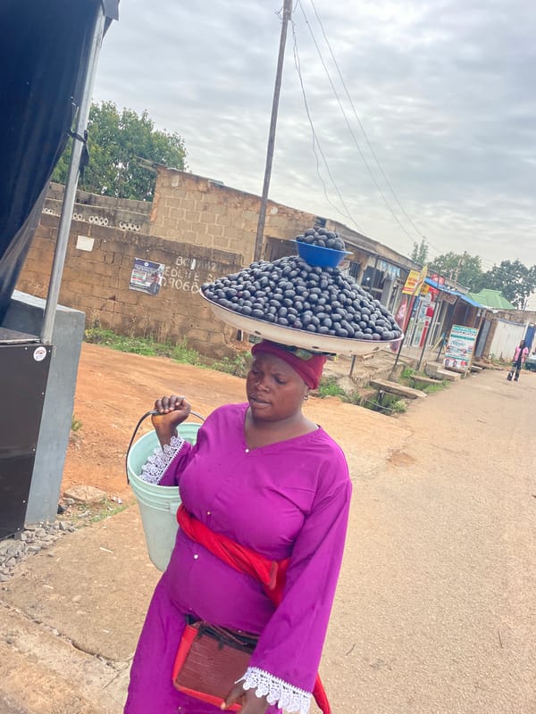 Street vendors conduct morning business in Jos, Nigeria