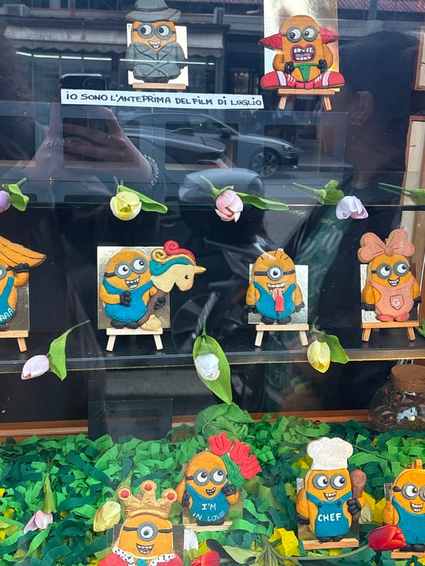 Handmade Minion figures displayed in Milan shop window