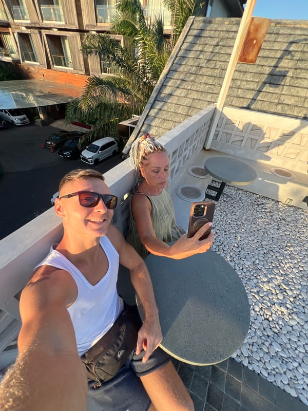 Tourists take rooftop selfies and sightsee in Kuta, Indonesia