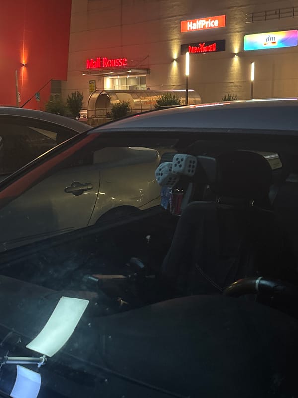 Evening activity near Mall Rousse includes tow truck and police presence