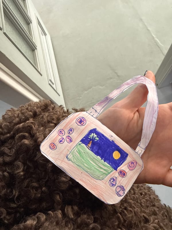 Child's craft and cushion documented in Krasnoyarsk home