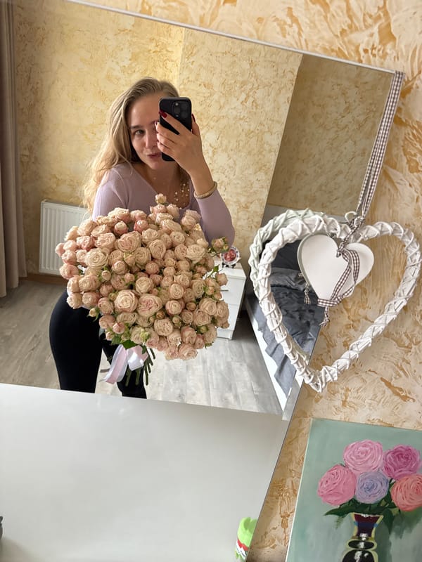 Woman celebrates with roses and breakfast documentation