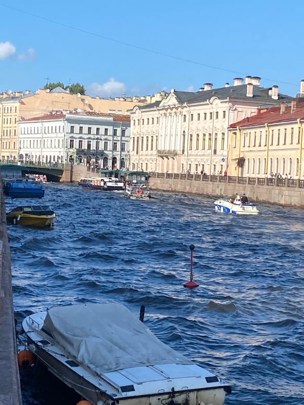 Busy summer afternoon on Saint Petersburg's canals and embankments
