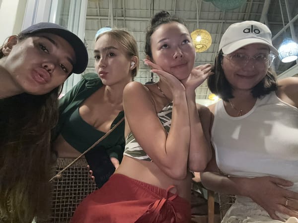Friends share coconut drinks and selfies at North Kuta café
