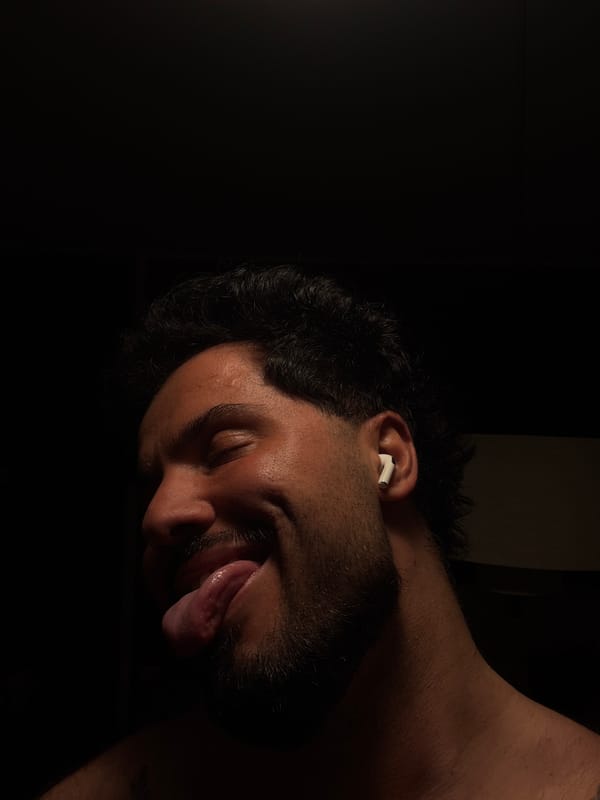 Man photographed twice in Milan elevator and portrait session