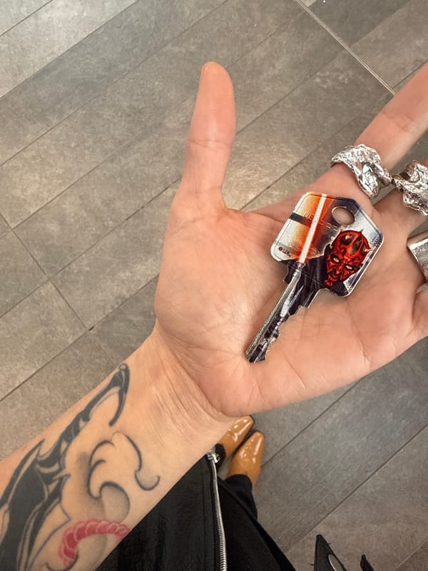 Person browses decorative key collection in North Vancouver store