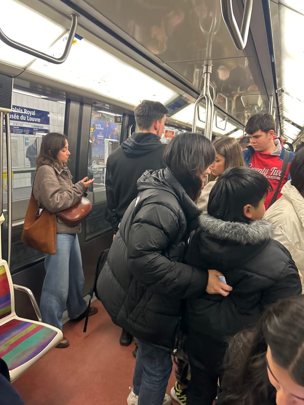Crowded Paris Métro train during regular commute hours