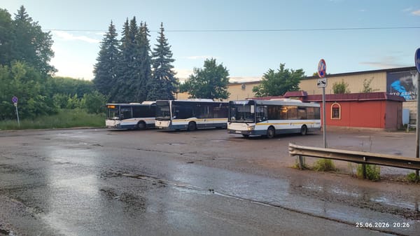 Wet streets and a bus depot in Lytkarino after rain