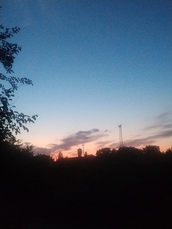 Dusk sky and quiet devotion, one evening.