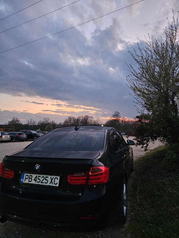 Evening twilight scene documented in Krasnovo, Bulgaria with parked BMW