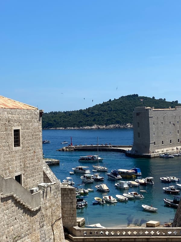Dubrovnik Old Town and harbor on a sunny summer afternoon