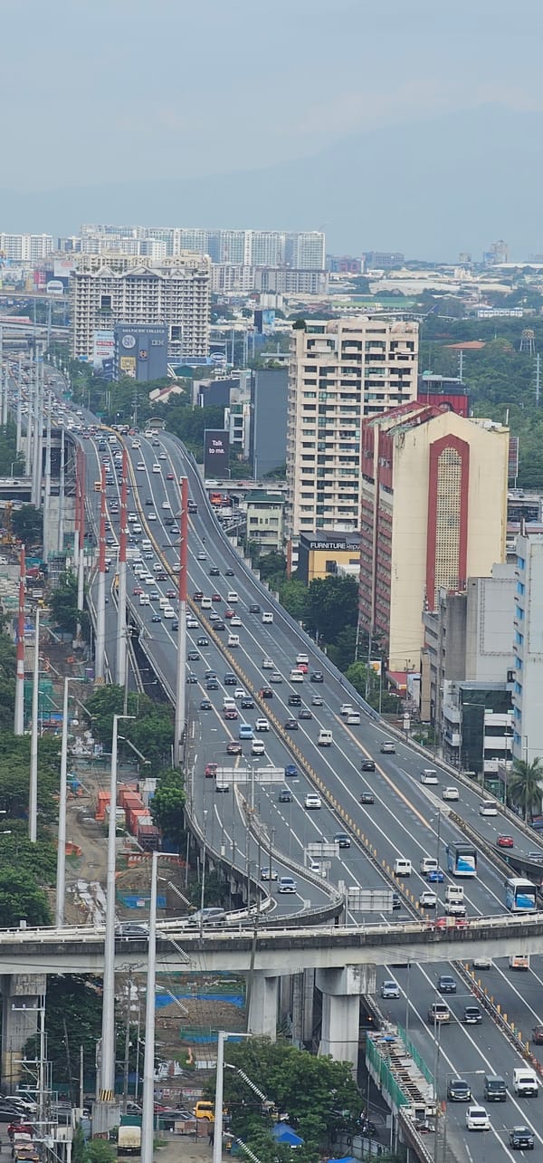 Makati traffic and urban street scenes on a hazy morning