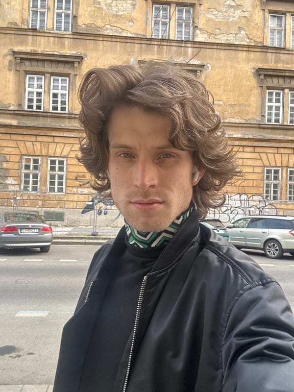 Man in black jacket photographed in Prague