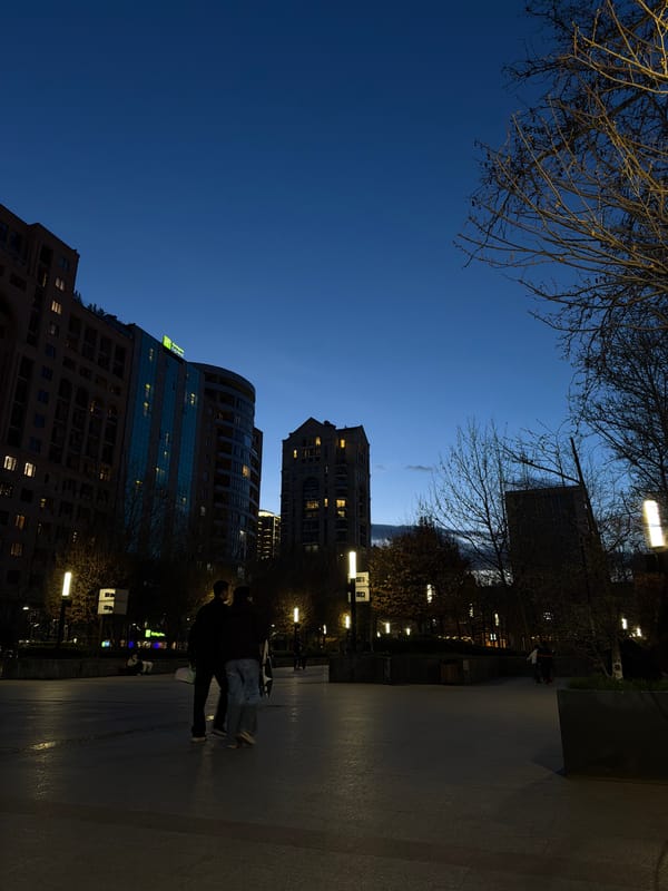 Evening transition captured across central Yerevan plaza and streets