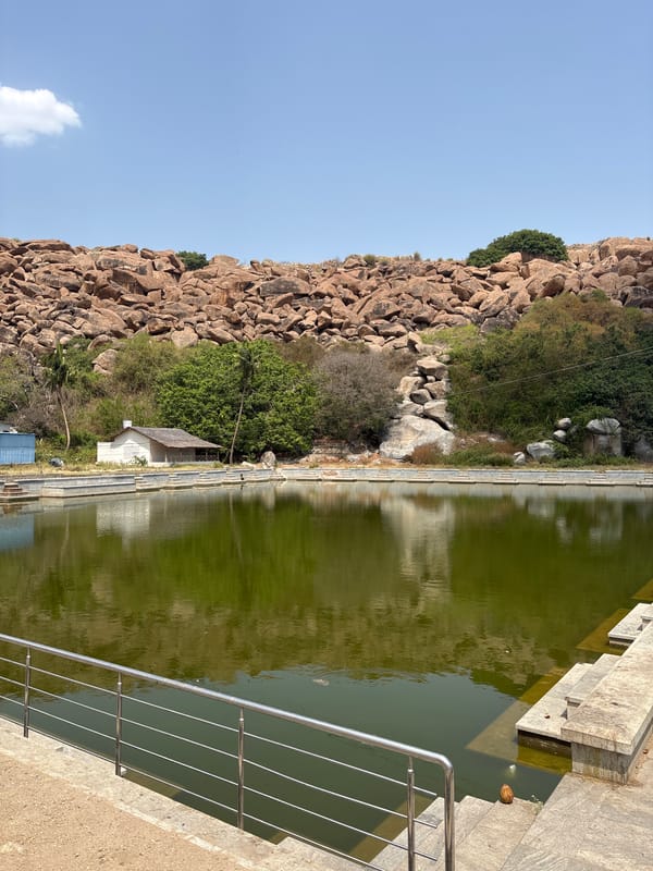 Rock formation observed beside water body in rural India