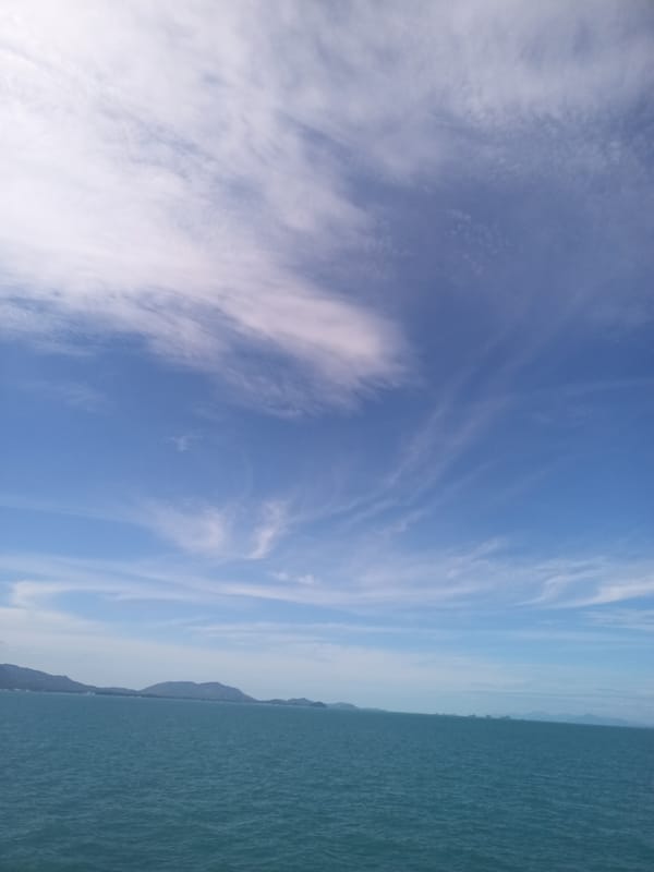 Ko Samui scenes: ocean view and tropical fruit display