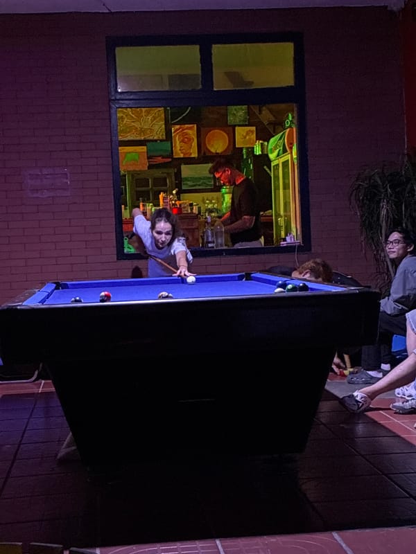 Evening social gathering at Da Nang bar features pool games