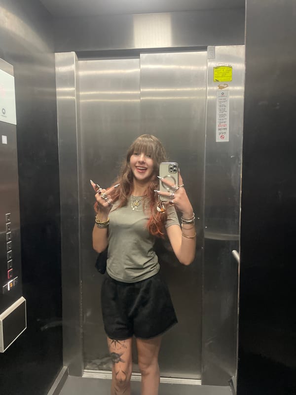 Woman takes elevator mirror selfies in Raanana