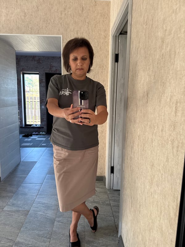 Woman Takes Mirror Selfies in Hallway During Early Morning Hours