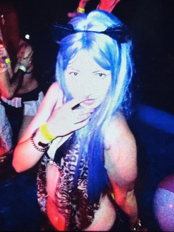 Late night pool party with colorful costumes in Milan