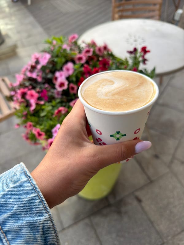 Coffee moment captured with flowers in Tel Aviv