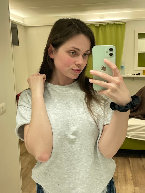 Women photographed taking selfies in Venice indoor locations