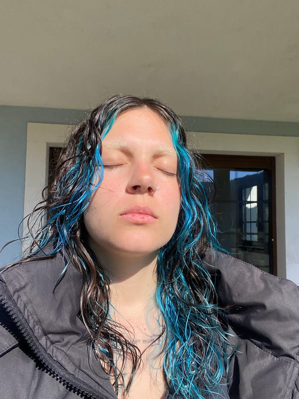 Woman exercises indoors, walks dog outdoors in Villaviciosa