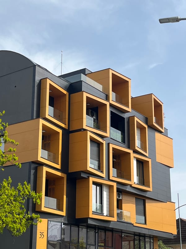 Modern building with gold cube windows observed in Novi Sad