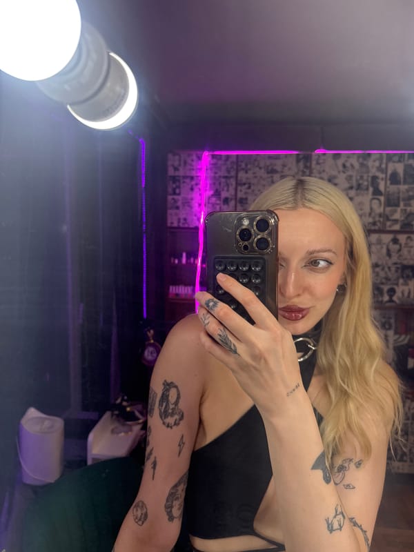 Late-night selfie session in a moody Moscow room